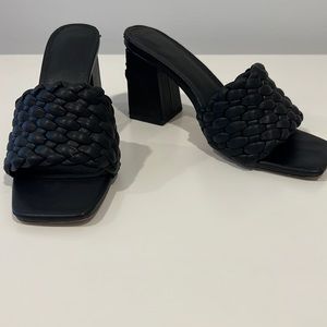 Black heeled slides
